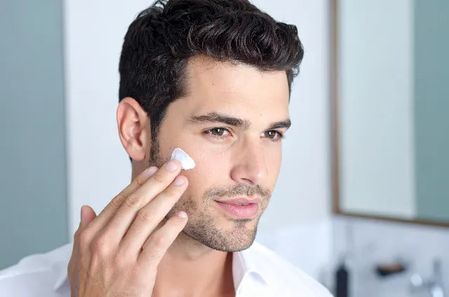 Best sunscreen for men showing man applying sunscreen to his face