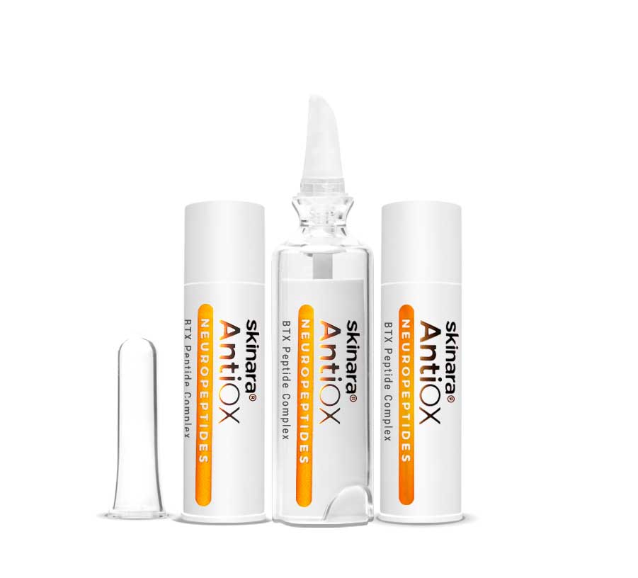 Three BTX Serum ampoules with 1 cap removed against a white background