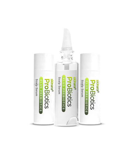 Three Skinara ProBiotics scalp treatment ampoules cap removed on a white background