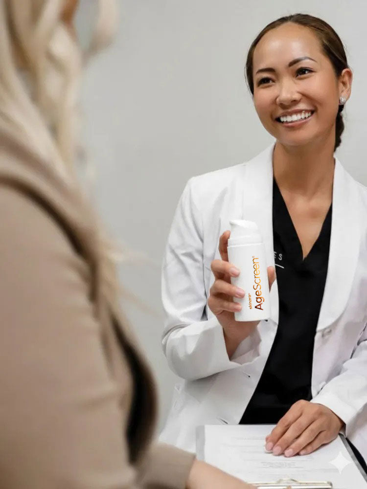 Skin professional speaking with a client in a clinic