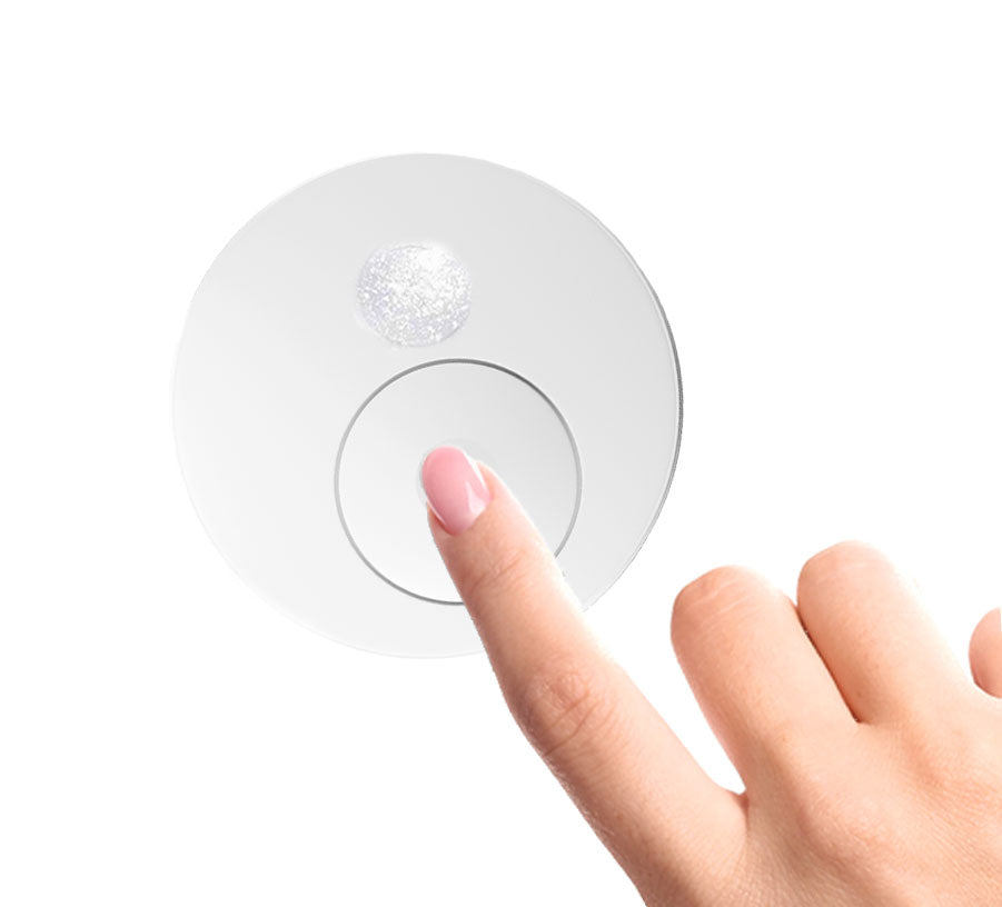 Finger pressing dispensing button on top of skinara bio serum jar