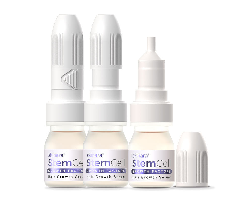 skinara hair growth serum ampoules with 1 cap removed on a white background