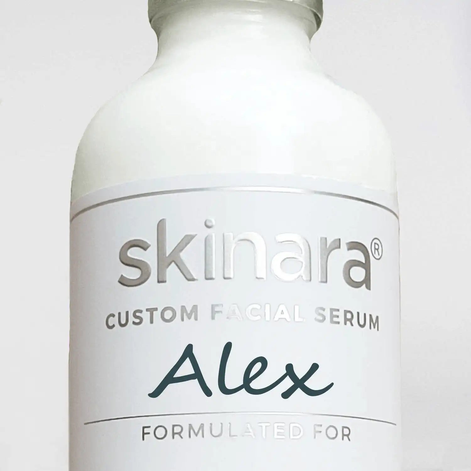 White facial serum bottle labeled 'skinara Custom Facial Serum Alex' free with skin testing service certified vegan skincare